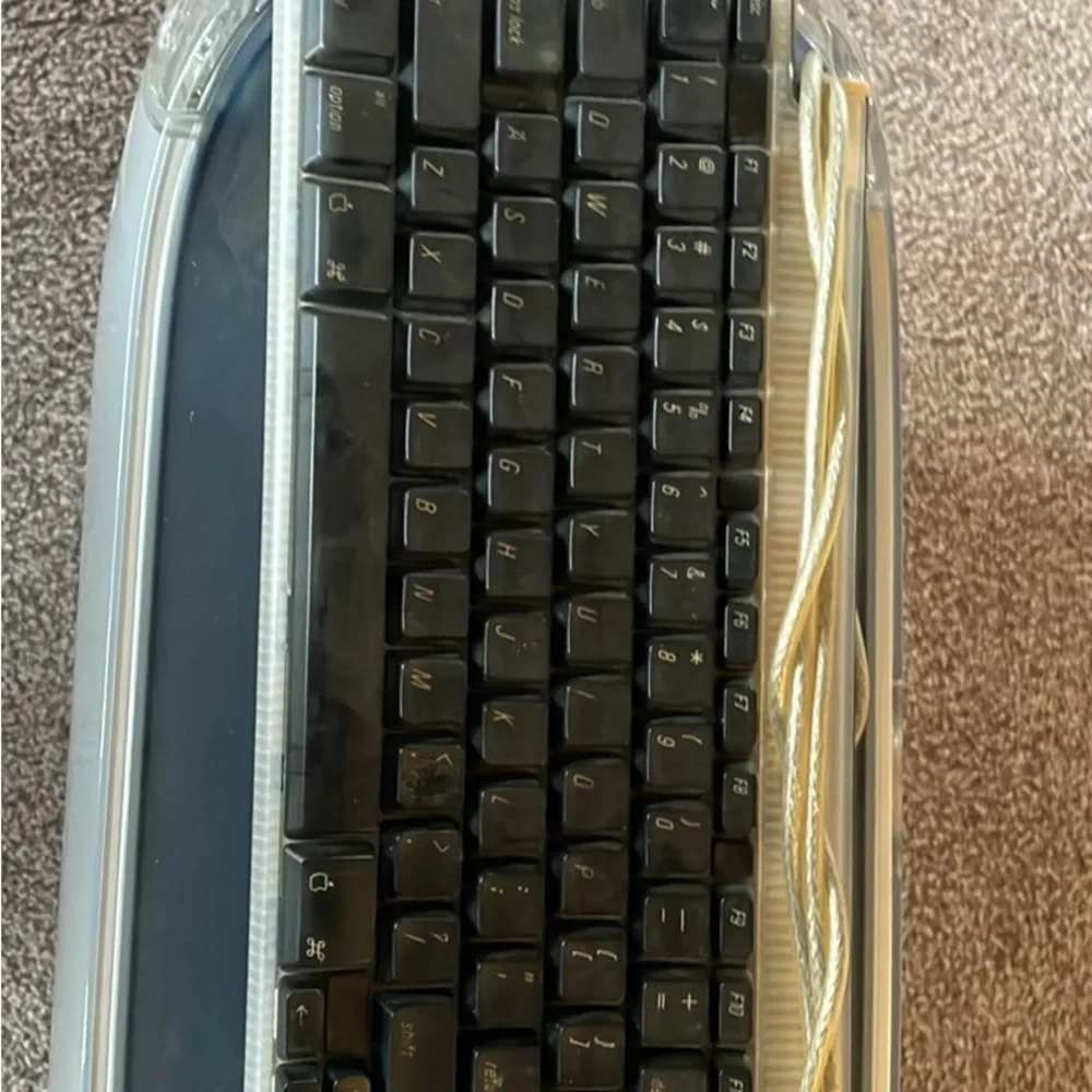 Apple Silver and Black Desktop with original Keyboard and mouse.
